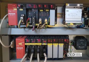 PLC Mitshubishi modernizare celula robotizata de lipit in industria automotive